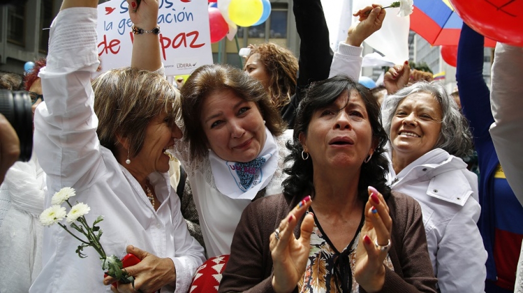 Women celebrating peace deal
