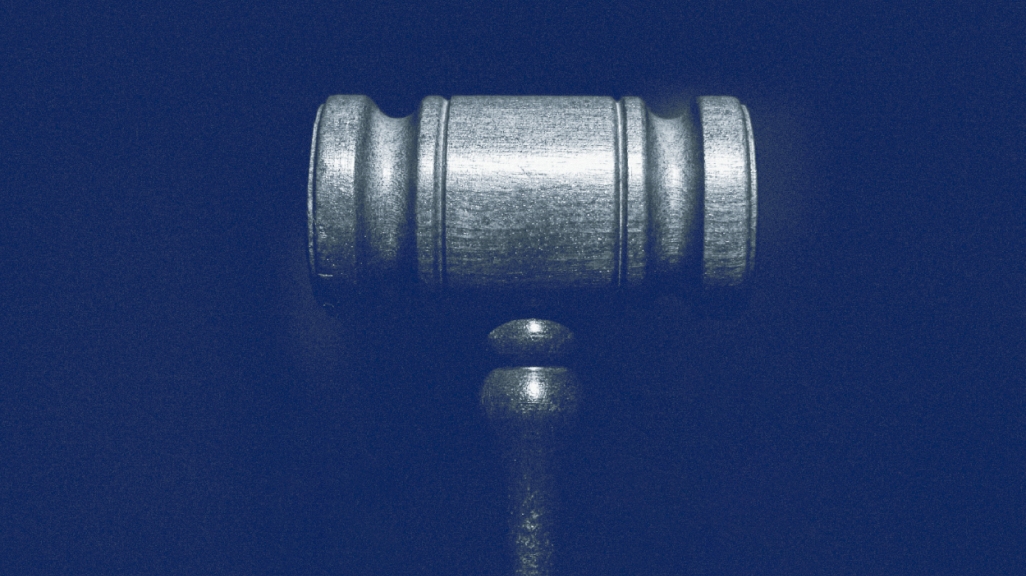 Graphic of gavel against blue background