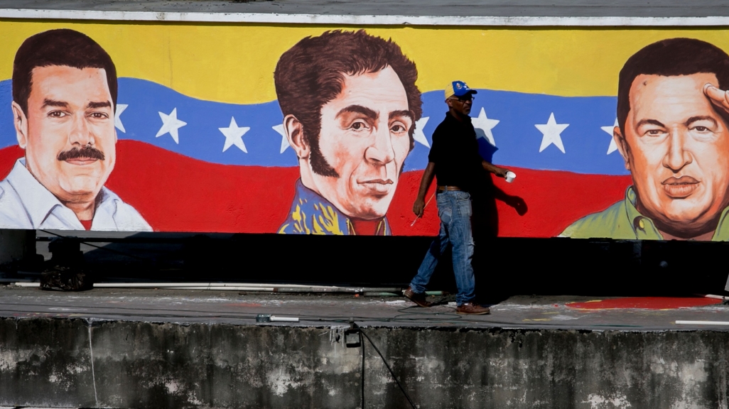 A Mural in Caracas Venezuela Featuring Maduro, Bolivar, and Chávez