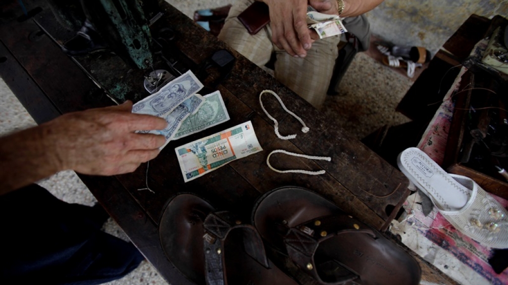 Money exchange at a small business in Cuba