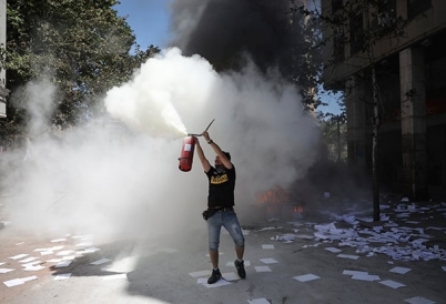 A protester in Chile (AP).