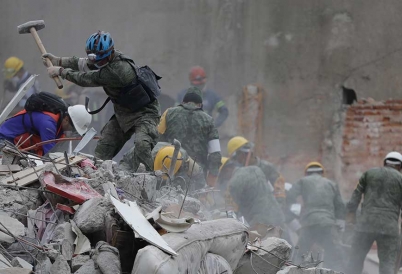 Rescue workers search for survivors after the September 19 earthquake