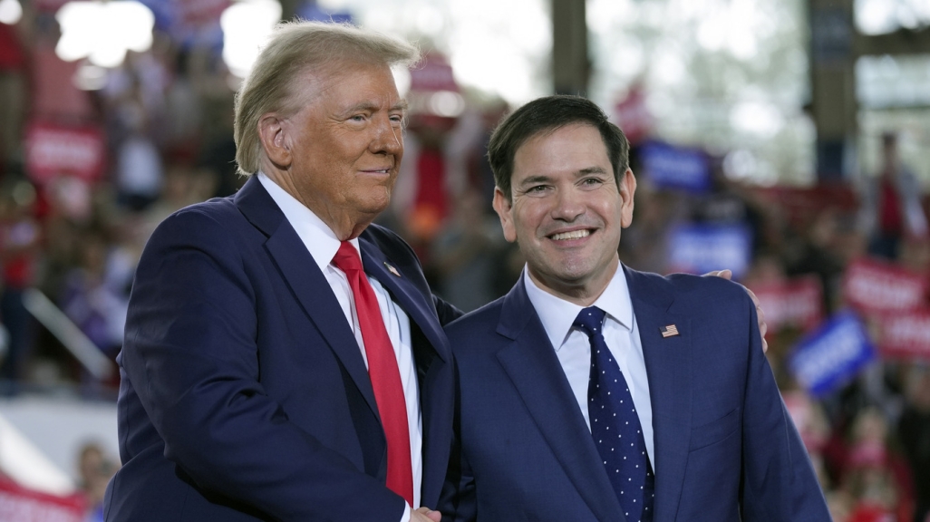 Donald Trump and Marco Rubio stand side by side, smiling.