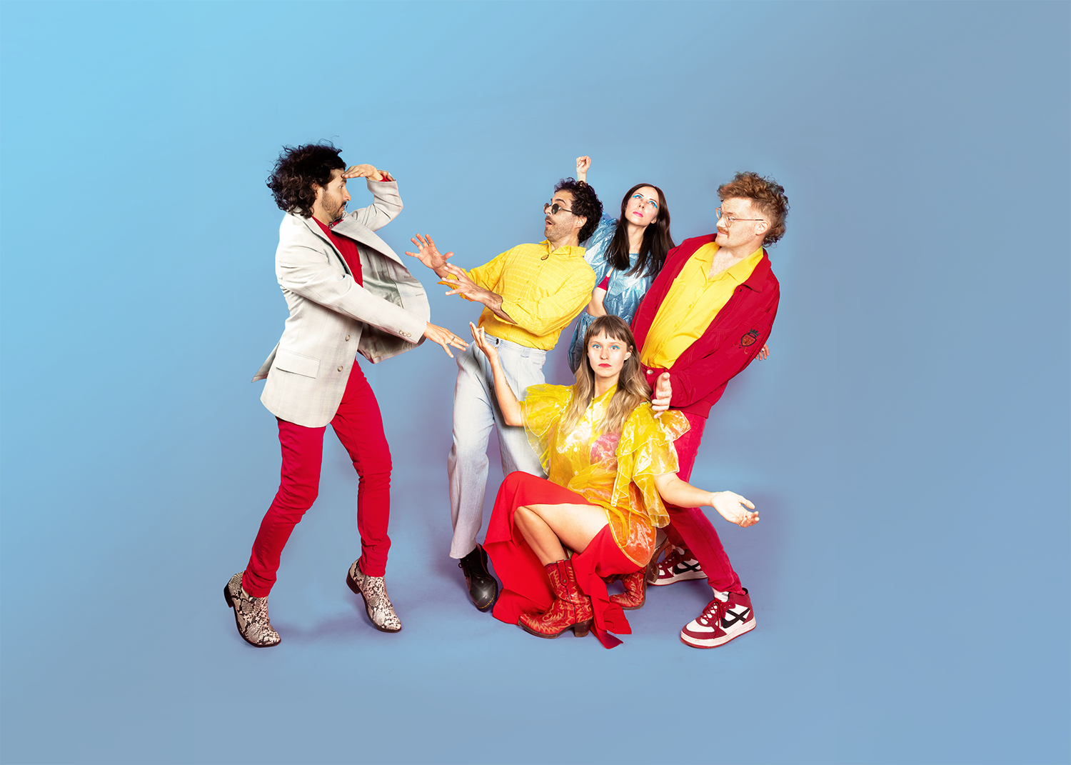 Five people in red, yellow, beige, and blue clothing pose in exaggerated comical stances against a blue background.