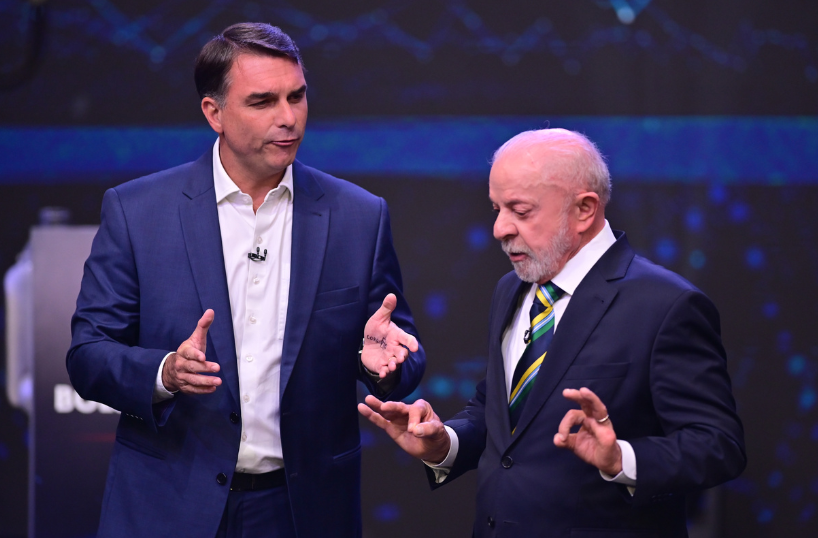Flavio Bolsonaro and Lula da Silva during presidential debate.