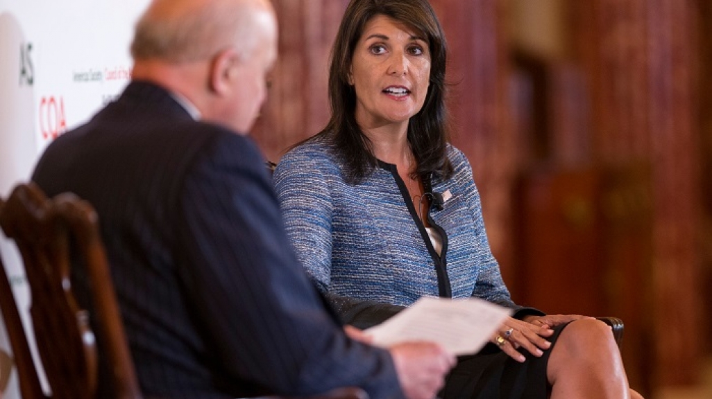 US Ambassador to the UN Nikki Haley talks with John Negroponte at the COA Washington Conference on the Americas