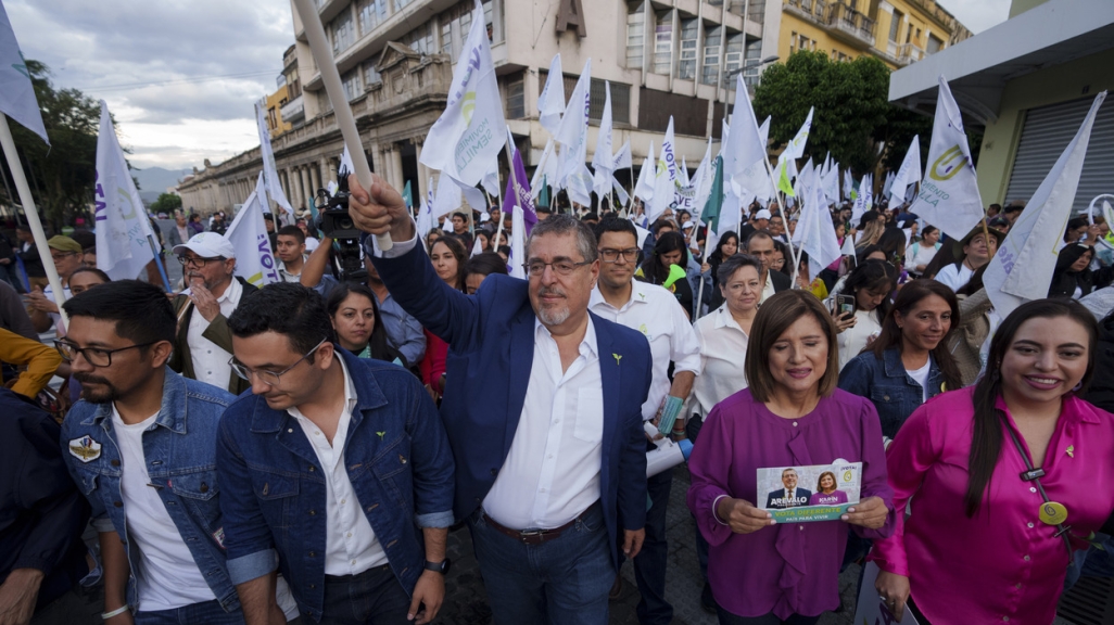 Bernardo Arévalo, center, exceeded expectations to make it to the runoff. (AP)