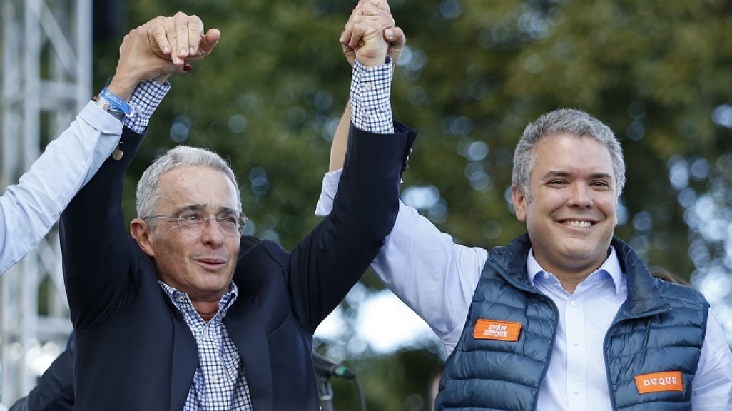 Alvaro Uribe and Ivan Duque (AP)