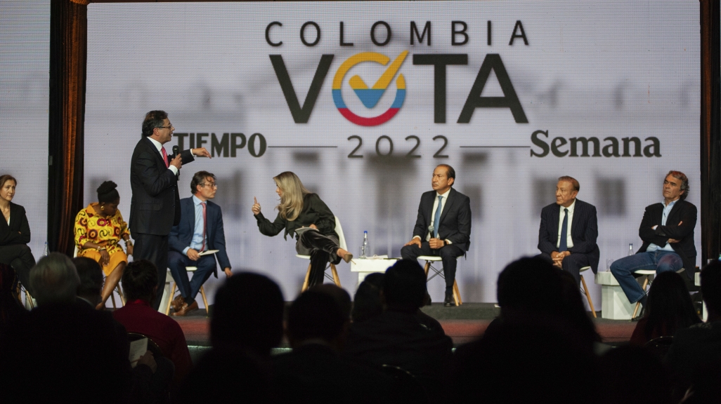 Gustavo Petro, standing, speaks at a debate in Bogotá. (AP)