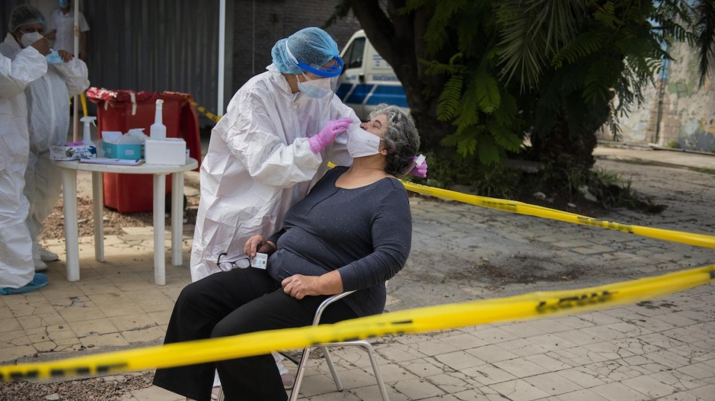 Woman in Uruguay gets COVID test. (AP)