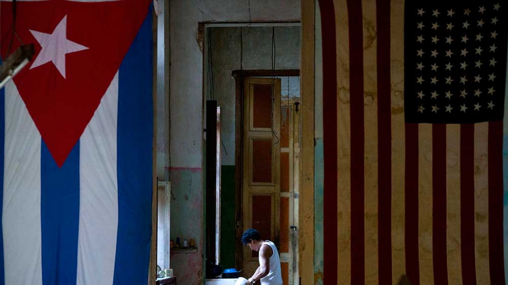 Cuban and U.S. flags in a Cuban home