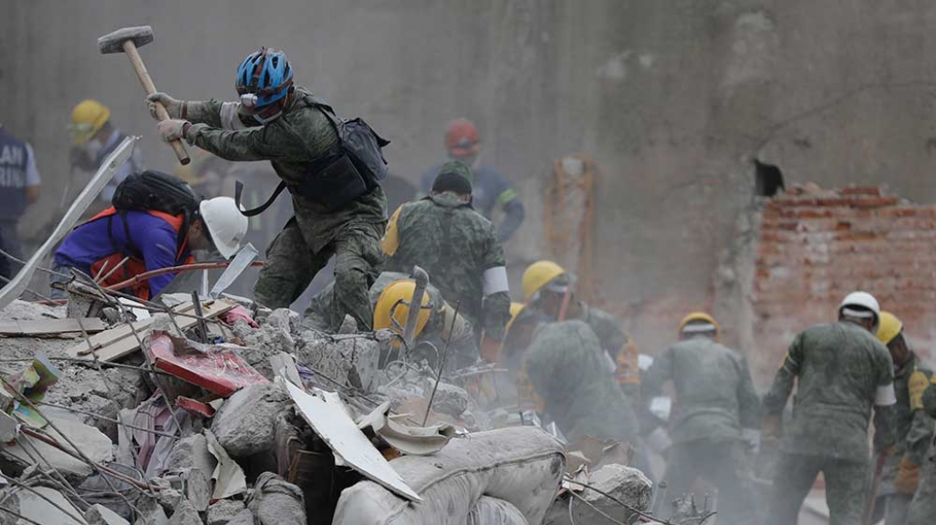 Rescue workers search for survivors after the September 19 earthquake