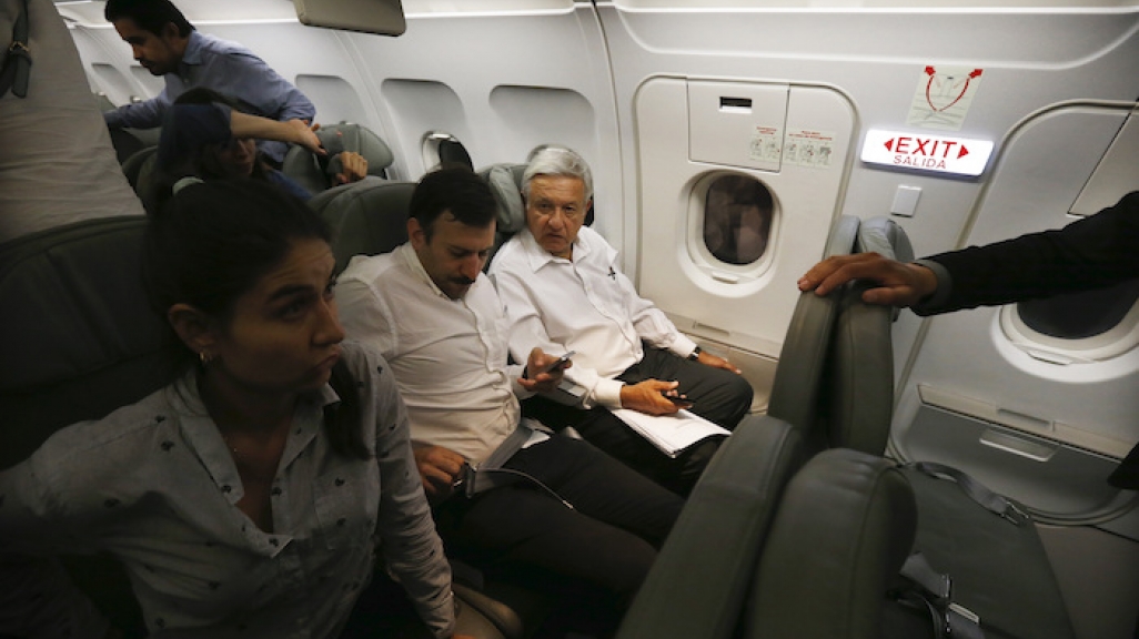 Mexican President AMLO flies coach. (AP)