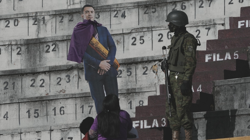 A cutout of President Daniel Noboa and a member of Ecuador's armed forces. (AP)