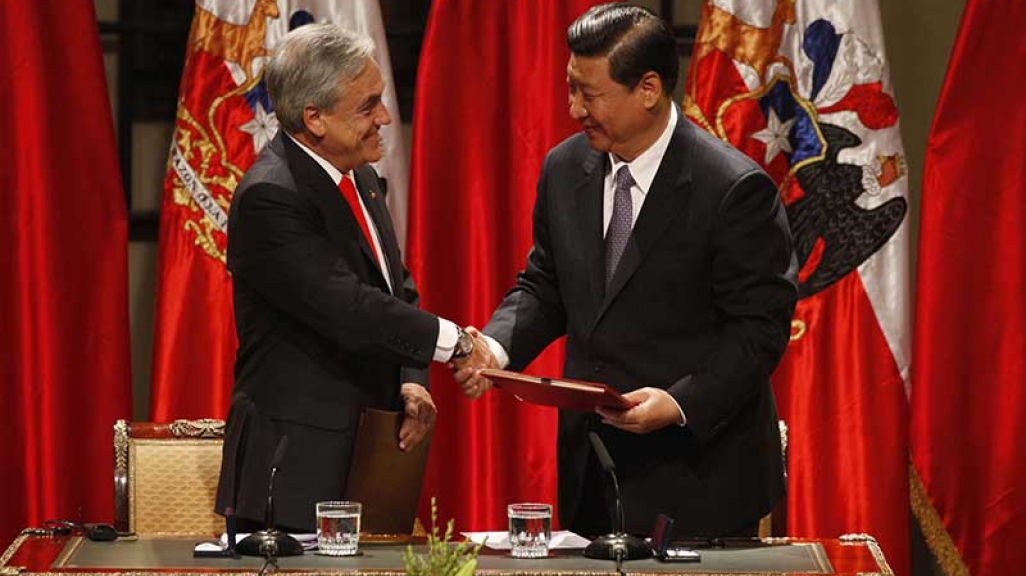 Sebastián Piñera and Xi Jinping. (AP)