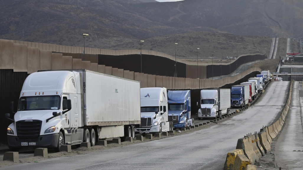 Trucks at the U.S.-Mexico border. (AP)