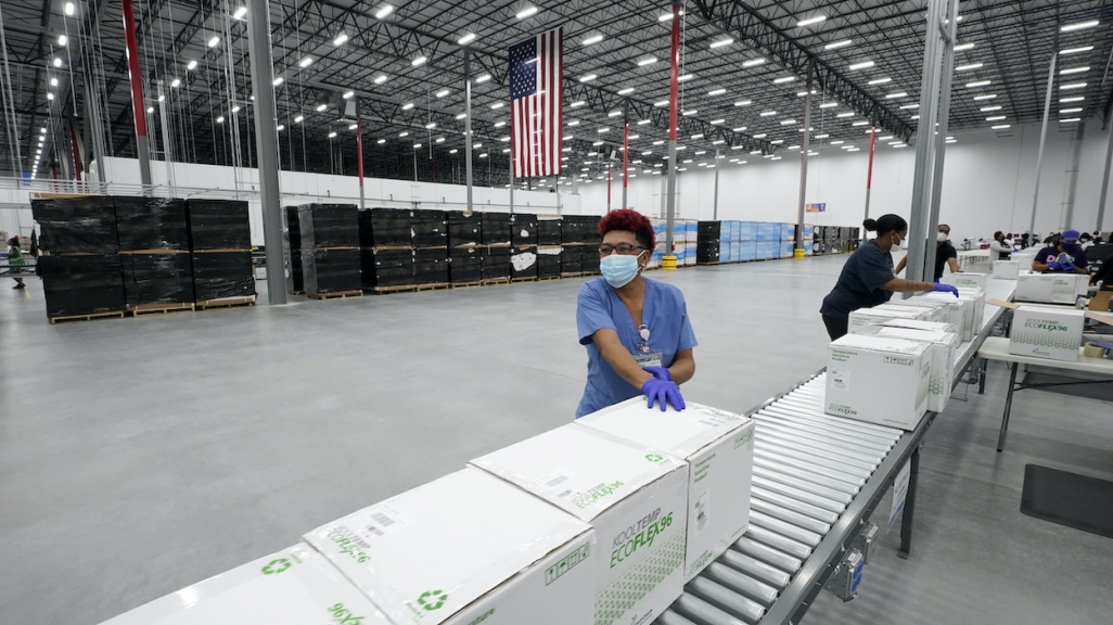 A Moderna employee in Mississippi readies vaccines for shipment. (AP)