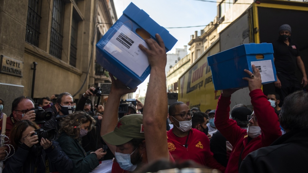Poll workers in Uruguay. (AP)