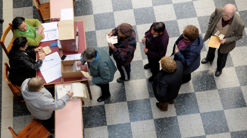 Voters line up at polling station for mayoral elections in Montevideo. 