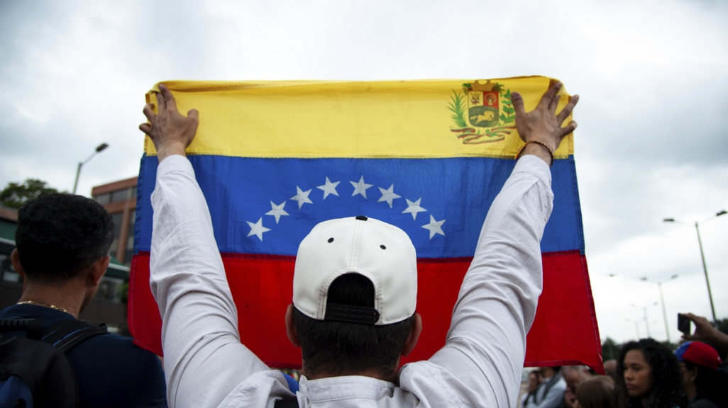 A participant in a rally in Venezuela. (AP)