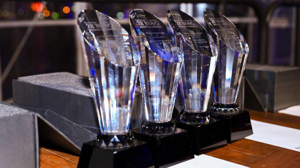 Four awards standing next to each other