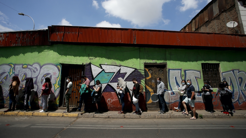 Chileans waiting to vote. 