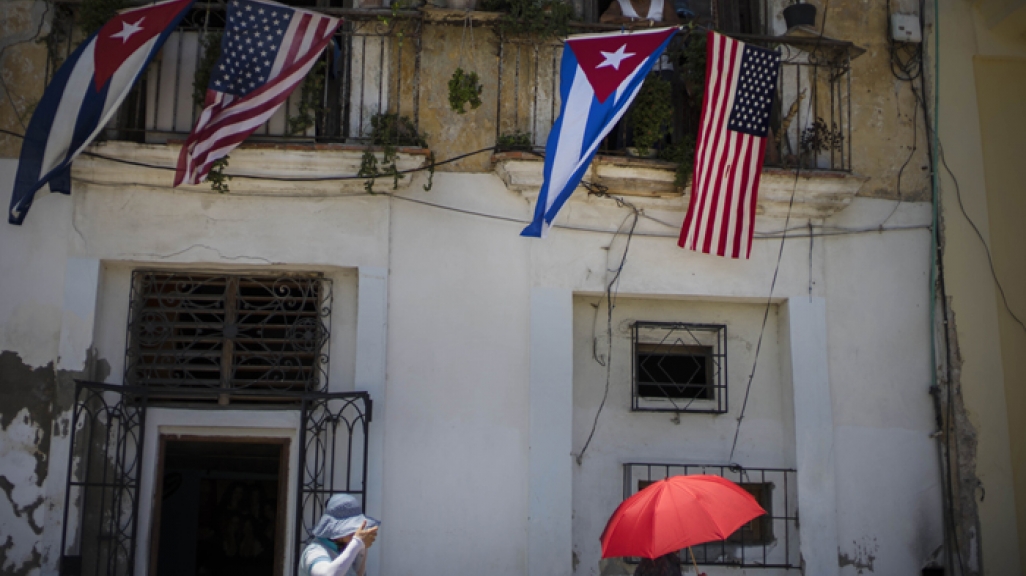 U.S. and Cuban flags in Cuba