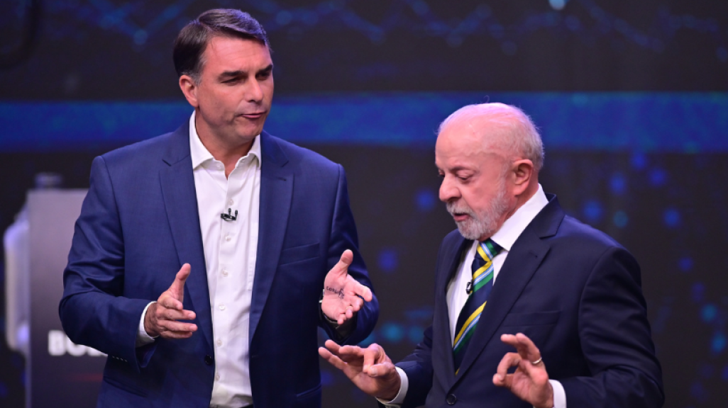 Flavio Bolsonaro and Lula da Silva during presidential debate.