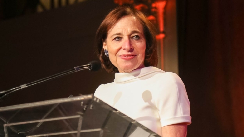 Susan Segal at a podium