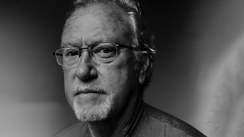 A black and white photo of Jon Lee Anderson.