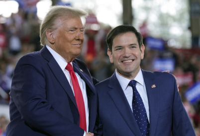 Donald Trump and Marco Rubio stand side by side, smiling.