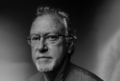 A black and white photo of Jon Lee Anderson.