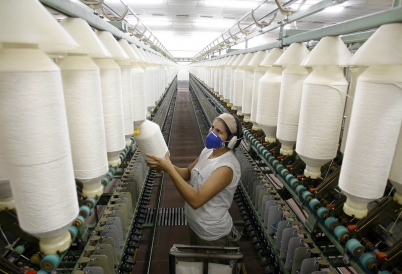 A woman in a cotton thread factory in Brazil. (AP)