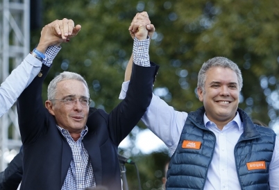 Alvaro Uribe and Ivan Duque (AP)