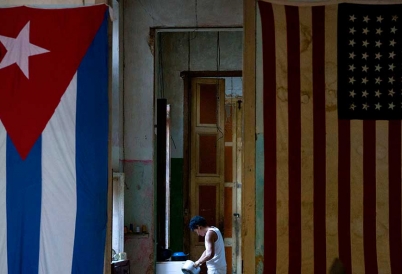 Cuban and U.S. flags in a Cuban home