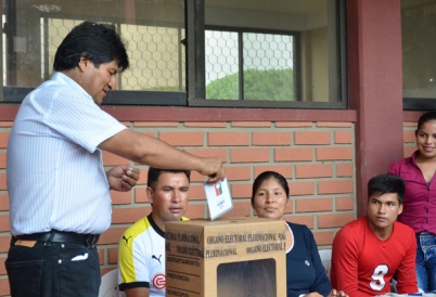 Bolivia's president votes on the constitutional referendum. 