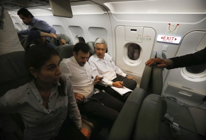 Mexican President AMLO flies coach. (AP)