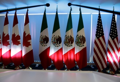 North American flags. (AP)