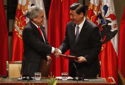 Sebastián Piñera and Xi Jinping. (AP)