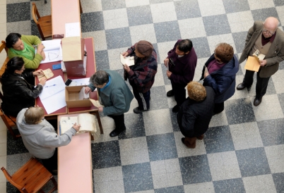 Voters line up at polling station for mayoral elections in Montevideo. 
