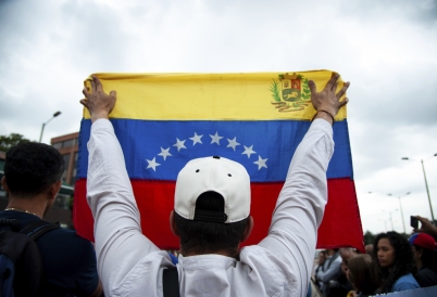 A participant in a rally in Venezuela. (AP)