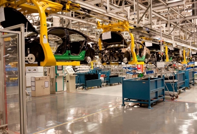 An automobile assembly line. (AdobeStock)