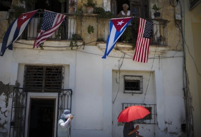U.S. and Cuban flags in Cuba
