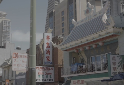 Street with asian symbols and english signs