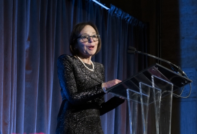 Susan Segal at a podium