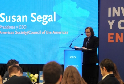 Susan Segal standing on the podium