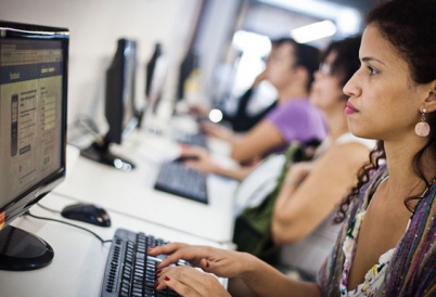 A woman on a computer in Brazil