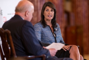 US Ambassador to the UN Nikki Haley talks with John Negroponte at the COA Washington Conference on the Americas