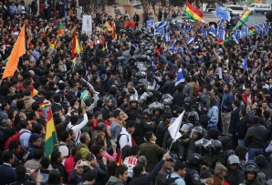 Police separate supporters of opposing candidates in La Paz. (AP)