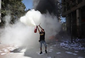 A protester in Chile (AP).